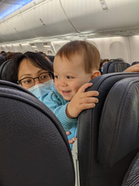 Young harrison totally psyched for his first flight.  He handled it pretty well.  None of that pressure-sensitive baby shrieking you hear about.  He managed to conk out at a reasonable time, too.