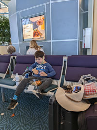 Despite the higher price, airport sandwiches are not particularly better than homemade sandwiches.  And, as at home, same level of giant mess.  At least the kids weren't complaining about hunger anymore.